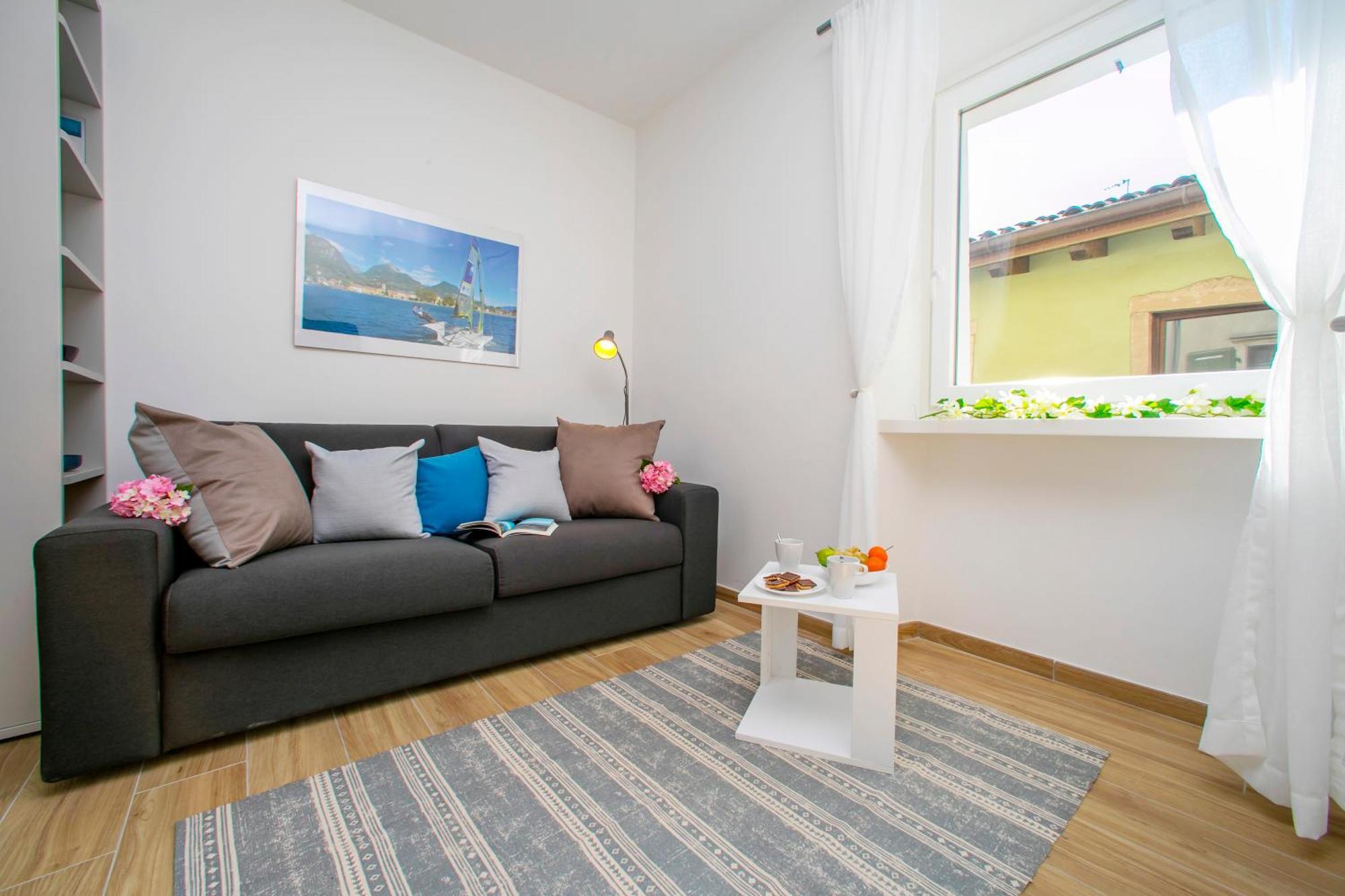 Nido Sui Tetti Di Riva Del Garda - Happy Rentals Ngoại thất bức ảnh