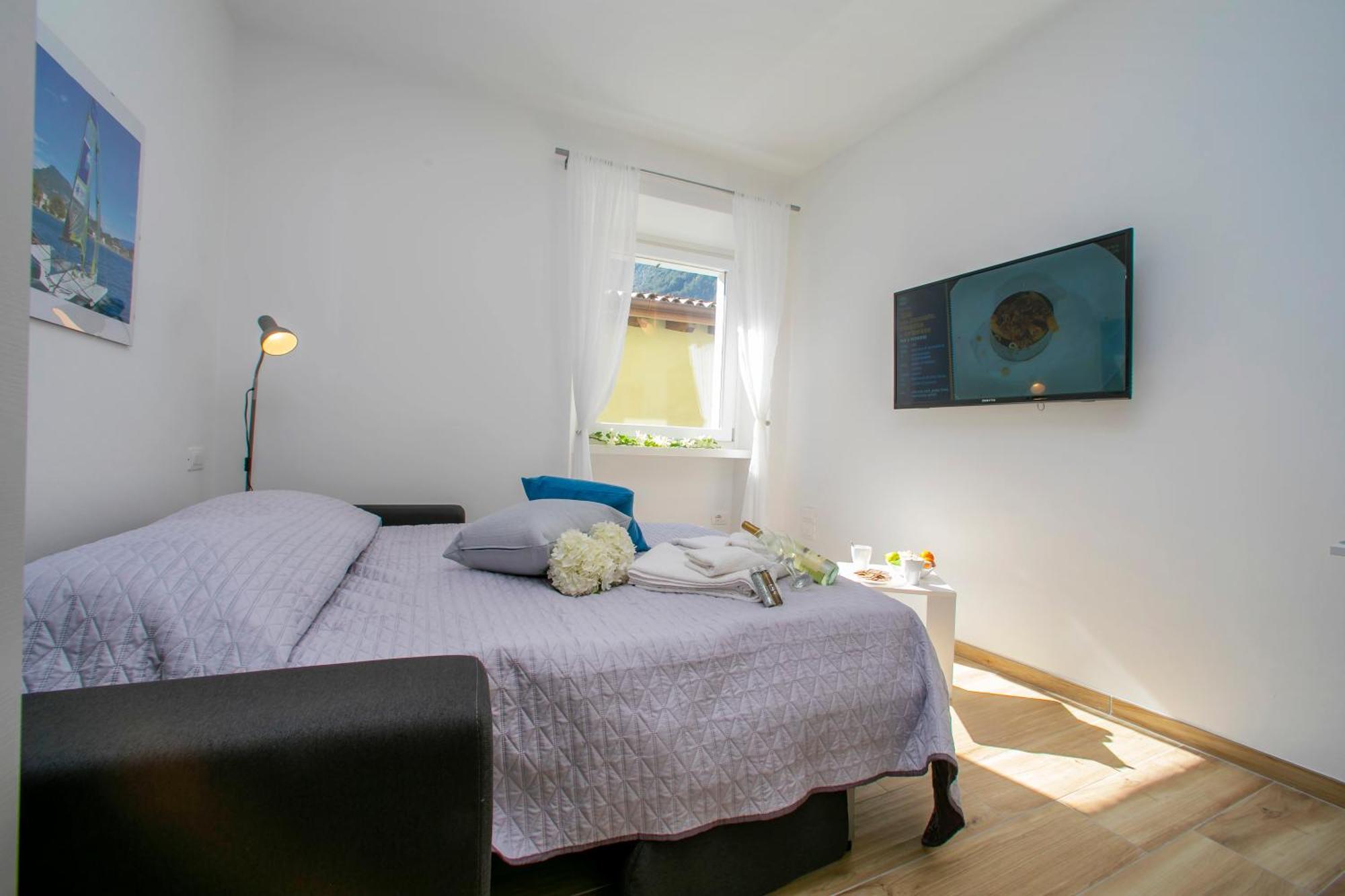 Nido Sui Tetti Di Riva Del Garda - Happy Rentals Ngoại thất bức ảnh