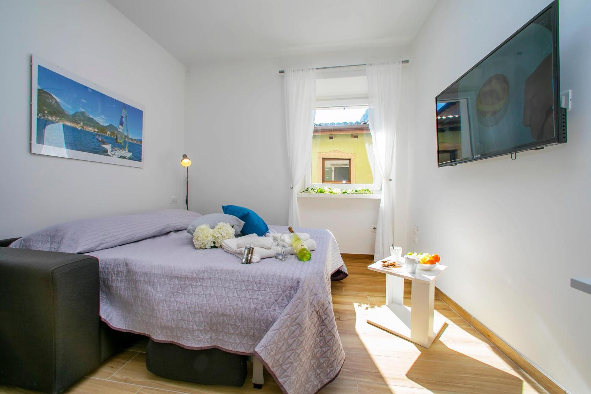 Nido Sui Tetti Di Riva Del Garda - Happy Rentals Ngoại thất bức ảnh